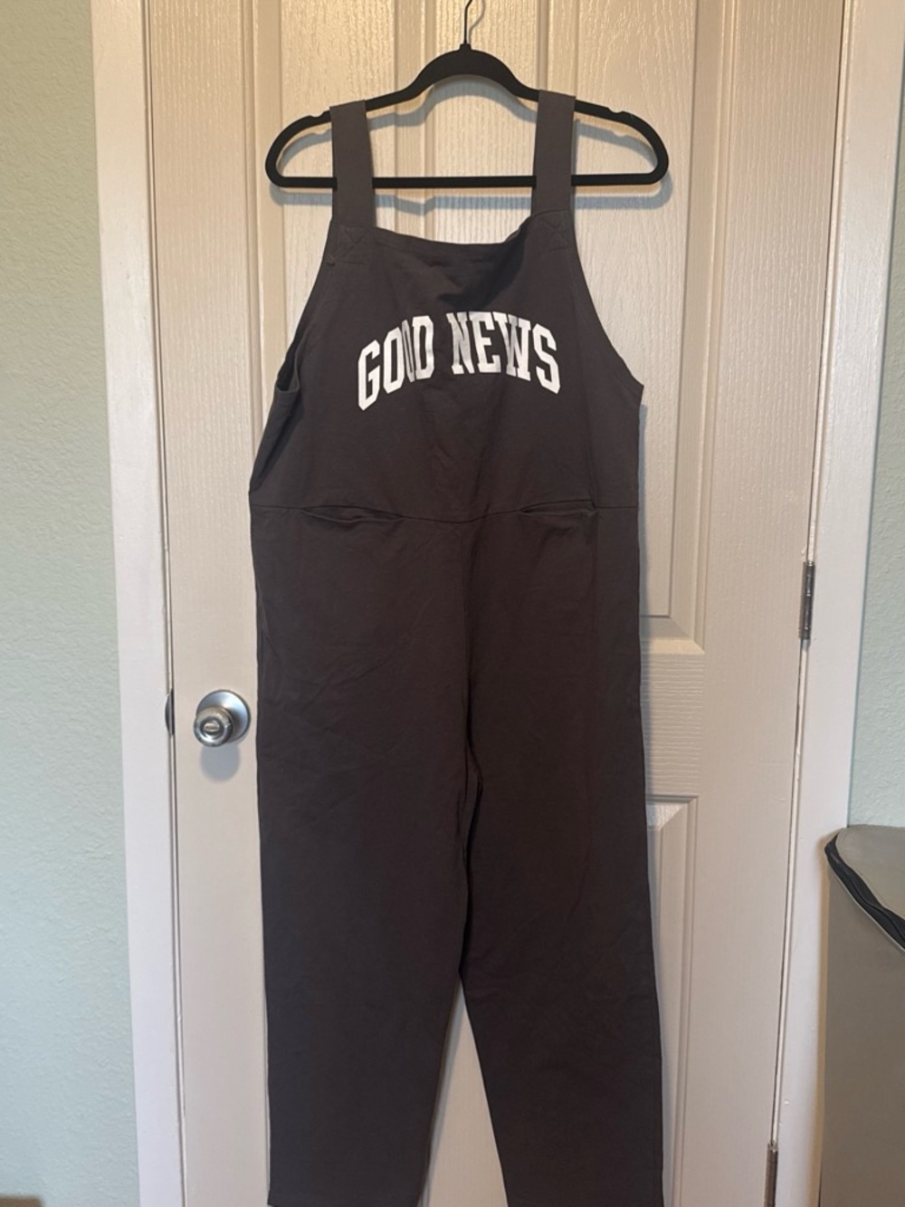 POL Black Jumpsuit with White 'GOOD NEWS' Chest Lettering